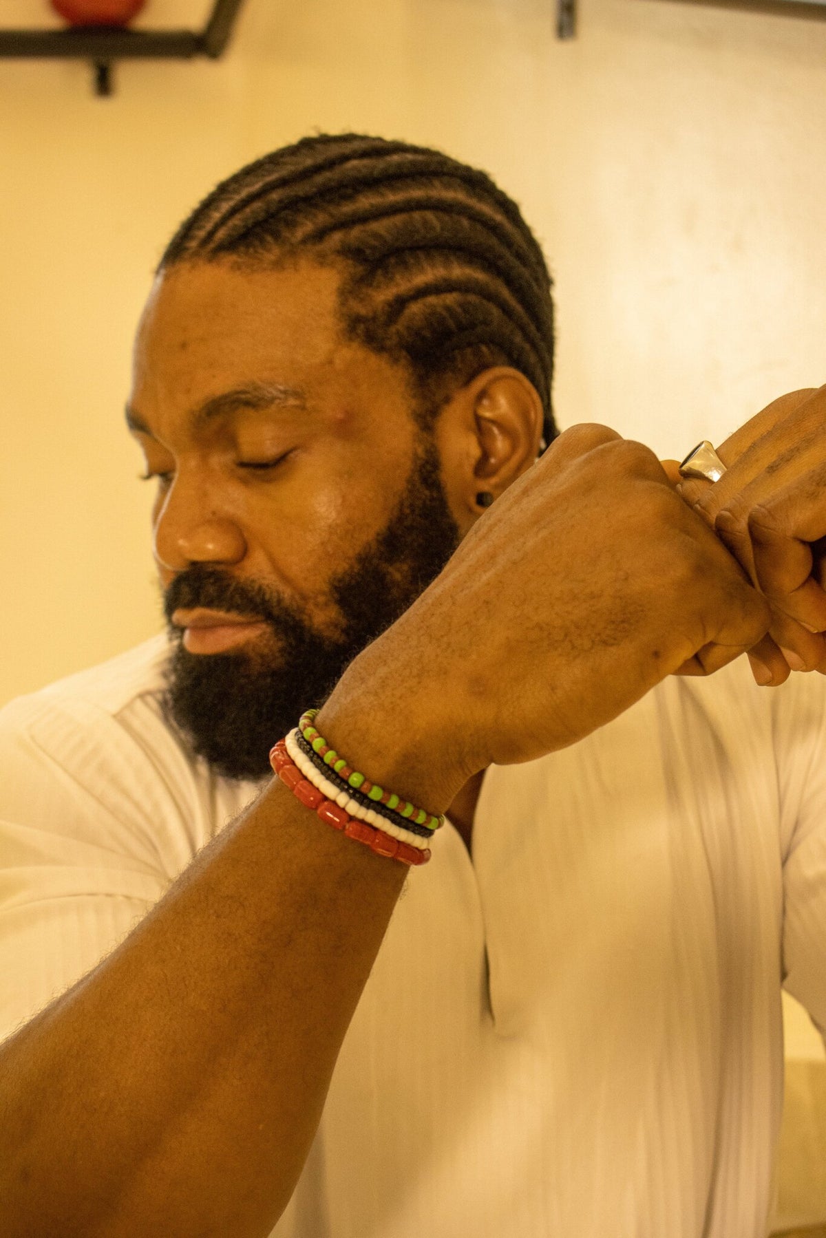 Hand-strung ancestral bead bracelet worn casually