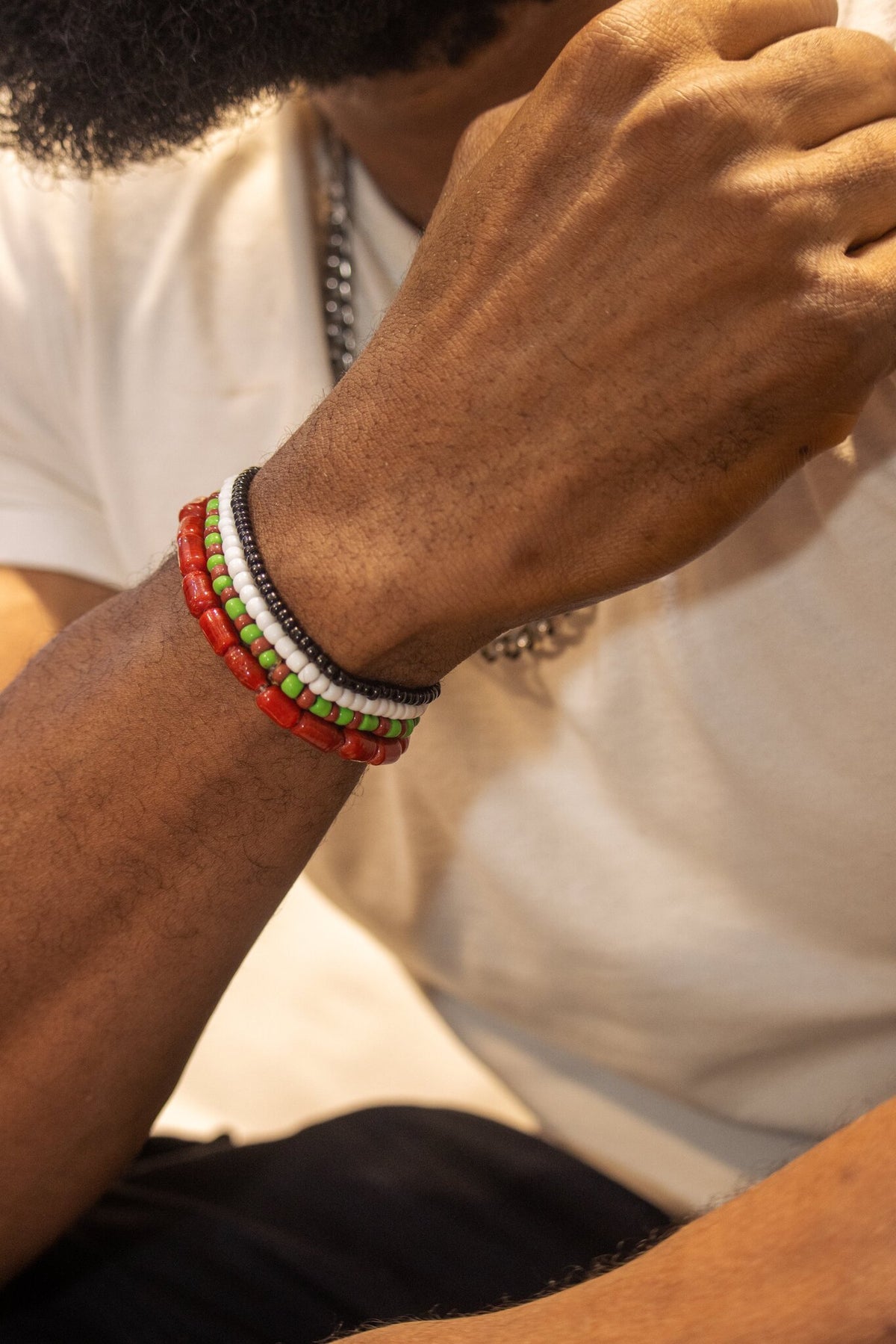 Hand-strung ancestral bead bracelet worn casually